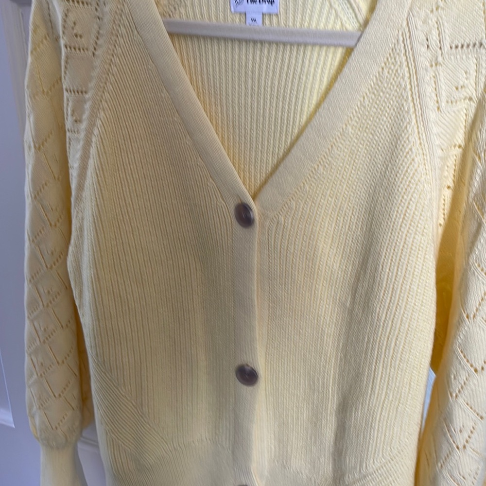 Yellow three button cardigan with ballooned sleeves